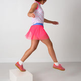 neon pink pleated skort