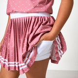dusty pink polka dot pleated skort