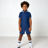 navy polka dot polo shirt