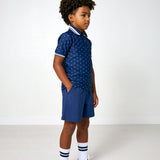 navy polka dot polo shirt