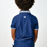 navy polka dot polo shirt