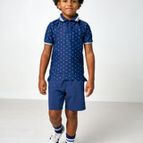 navy polka dot polo shirt