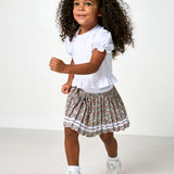 white ruffle tee