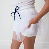 white pleated skort