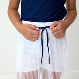 white pleated skort
