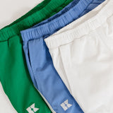 kelly green retro super short with white piping