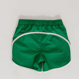 kelly green retro super short with white piping